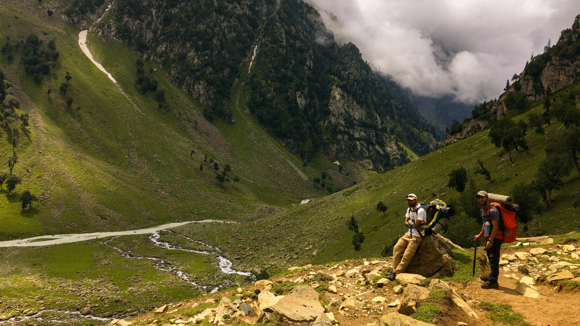 Trekkers enjoying a glimpse of Tarsar Marsar